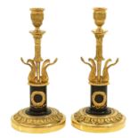 A Pair of Louis XVI Copper Candlesticks