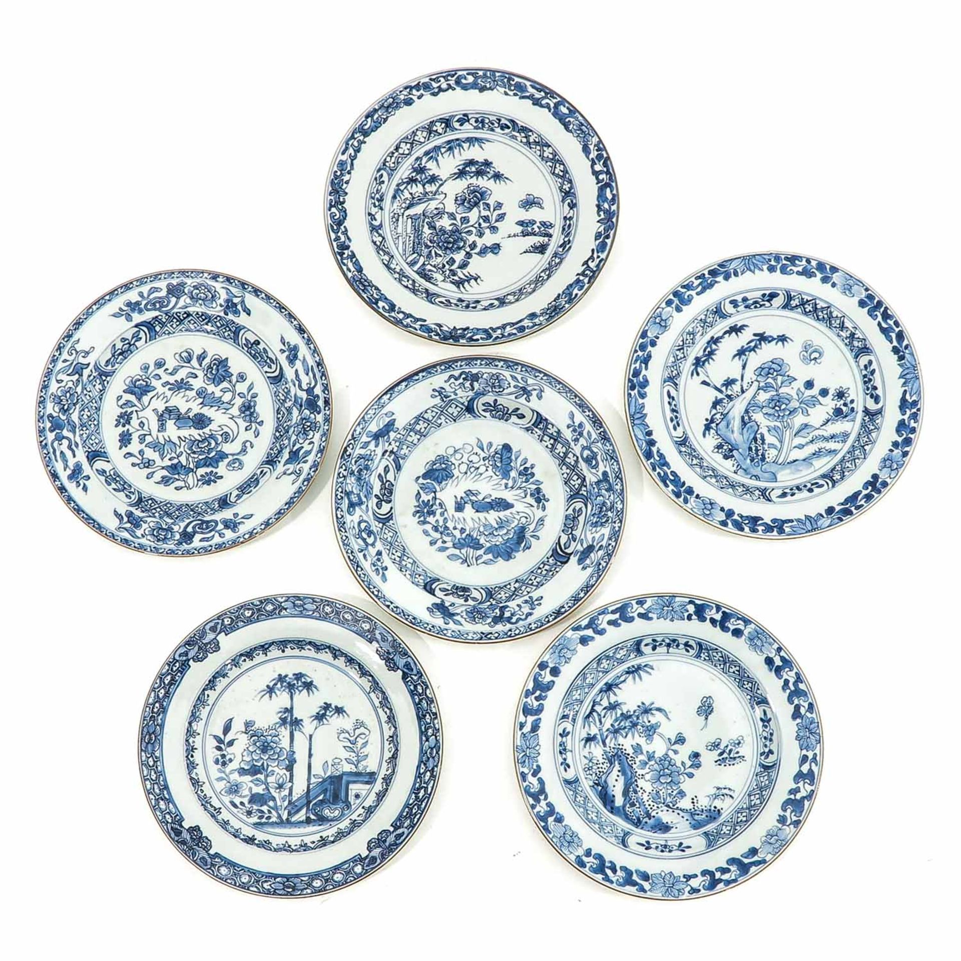 A Collection of 6 Blue and White Plates