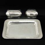 A Silver Tray with 2 Cookie Boxes