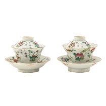 A Pair of Famille Rose Covered Cups and Saucers