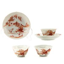 A Collection of Milk and Blood Decor Cups and Saucers
