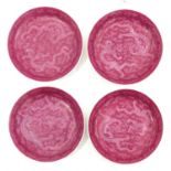 A Series of 4 Pink Plates