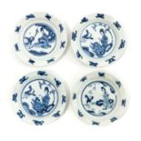 A Series of 4 Blue and White Miniature Plates