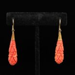 A Pair of Carved Red Coral Earrings