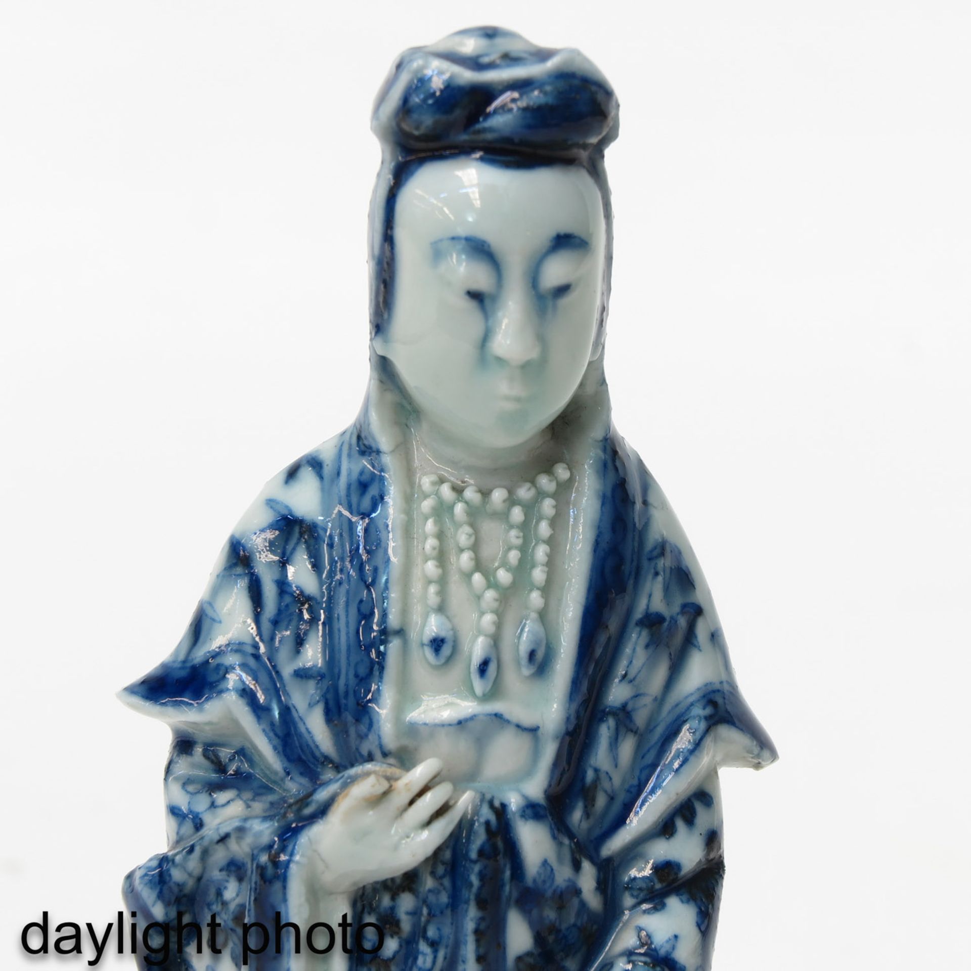 A Blue and White Chinese Quanyin Sculpture - Image 9 of 9