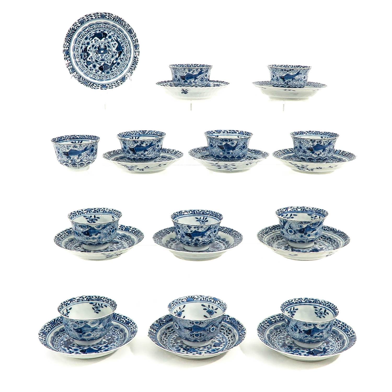 A Series of 12 Cups and Saucers