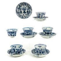 A Collection of Blue and White Cups and Saucers