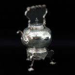 A Silver Coffee Pot and Comfort