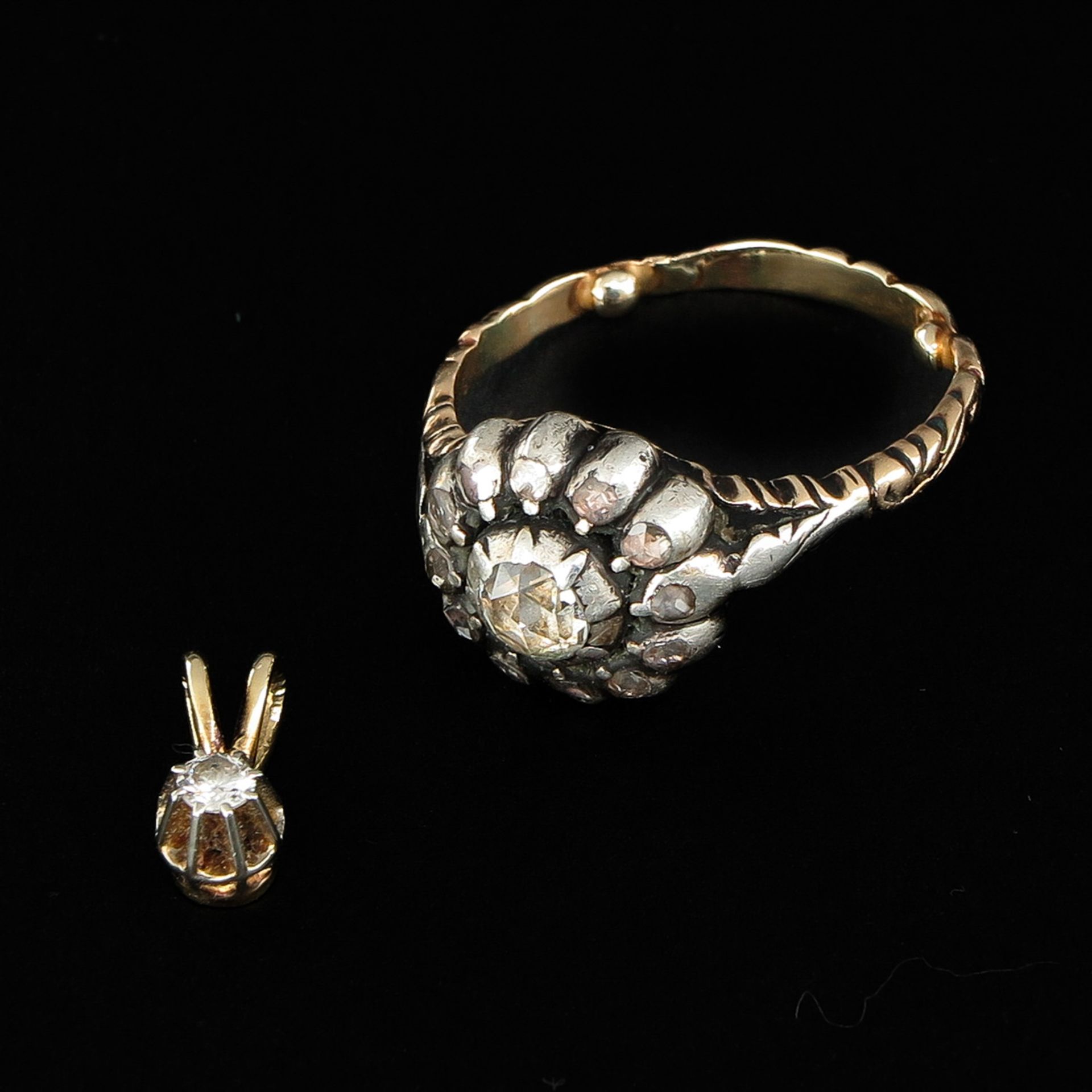 A Diamond Pendant and Ring