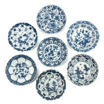 A Collection of 7 Blue and White Saucers