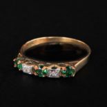 A Ladies 14KG Emerald and Diamond Ring