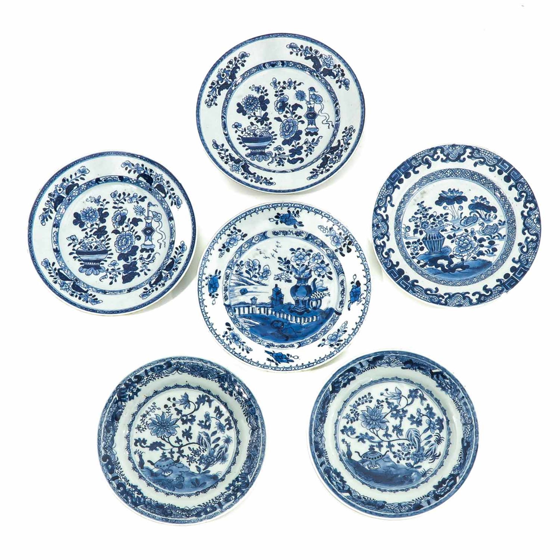 A Collection of 6 Blue and White Plates