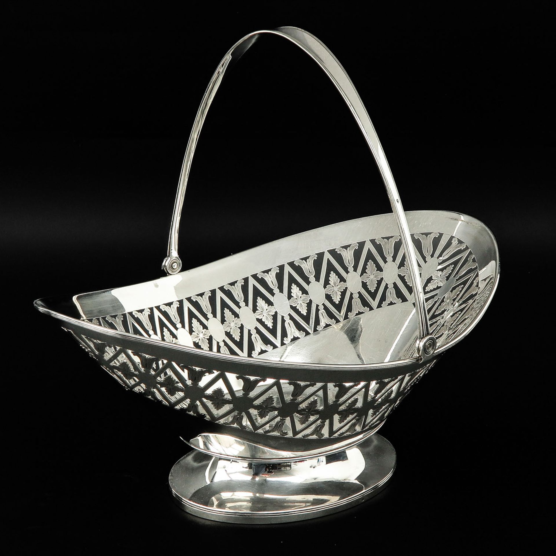 A Silver Basket with Handle