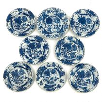 A Collection of 8 Blue and White Plates