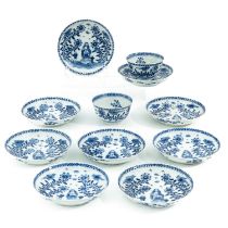 A Collection of Blue and White Cups and Saucer