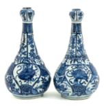 An Extremely Rare Pair of Blue and White Garlic Mouth Vases