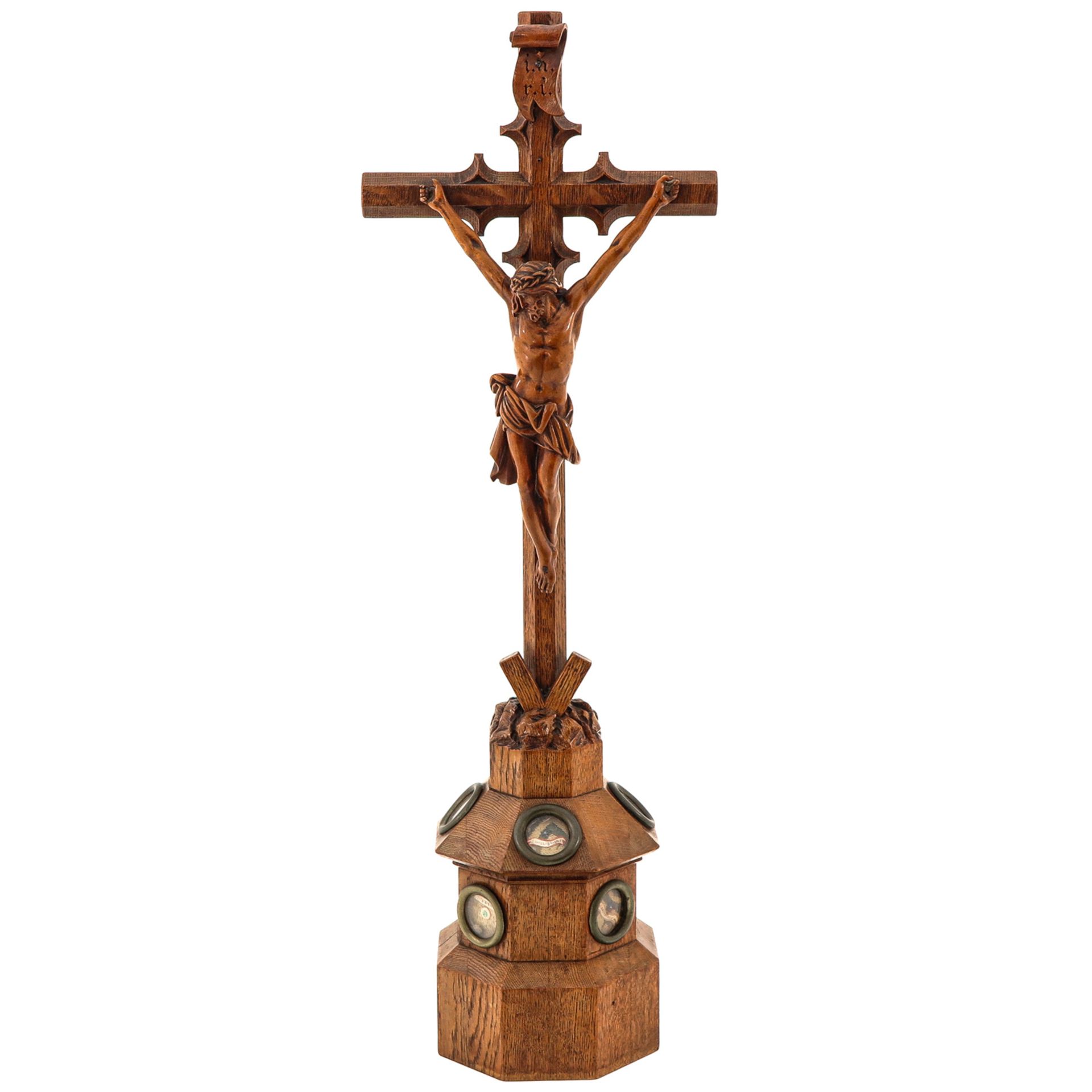 A 19th Century Crucifix holding 5 Relics