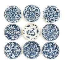 A Collection of 9 Blue and White Saucers