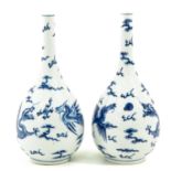 A Pair of Blue and White Bottle Vases