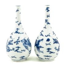 A Pair of Blue and White Bottle Vases