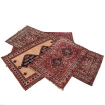 A Collection of 4 Persian Carpets