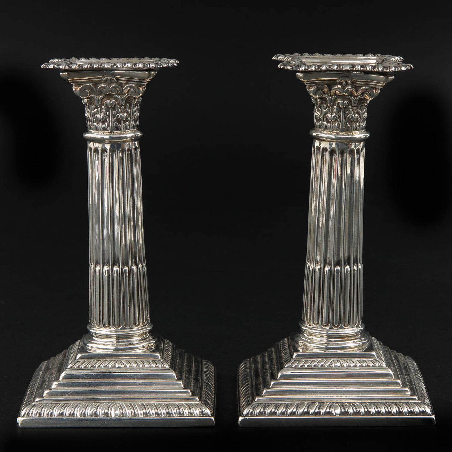 A Pair of English Silver Candlesticks