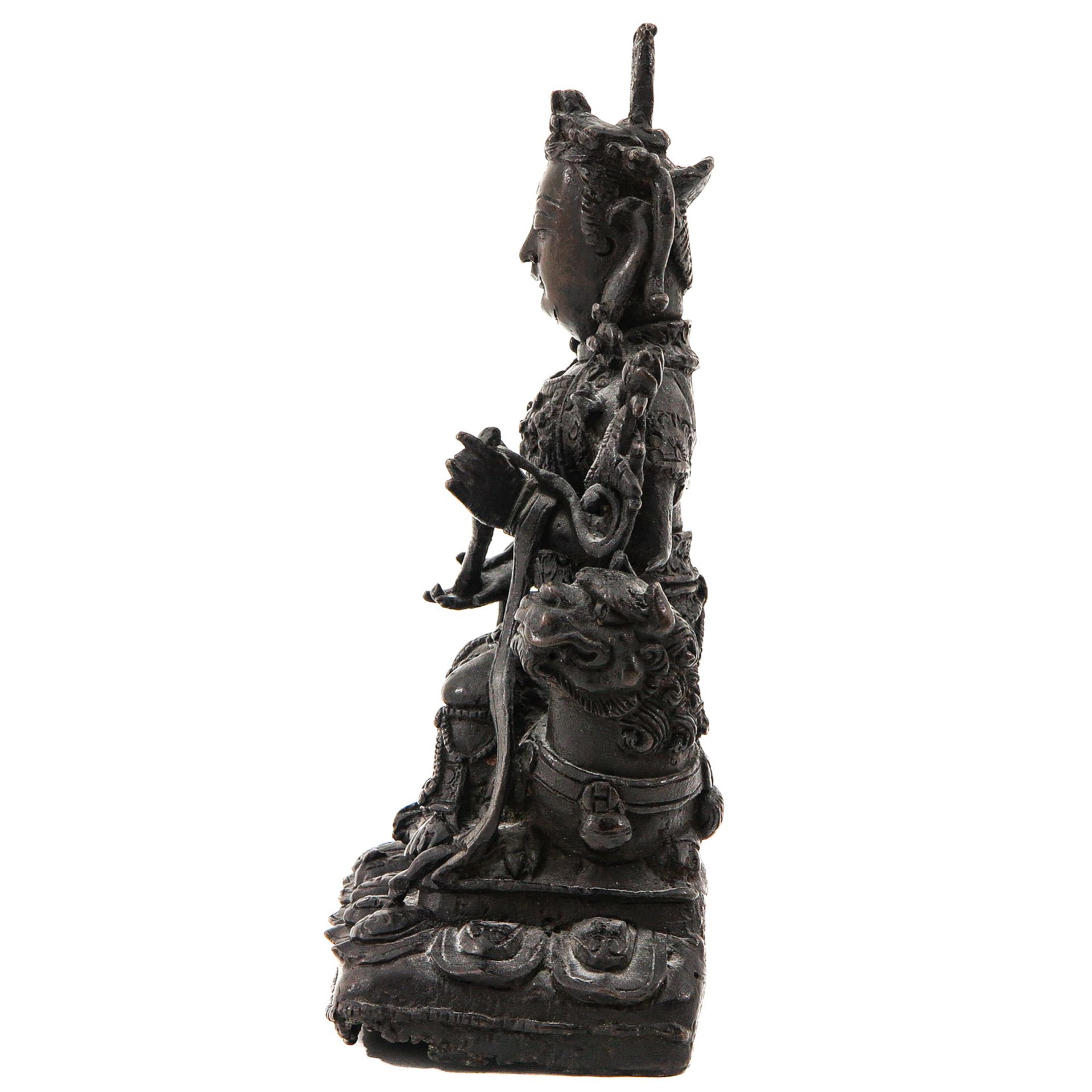 A Bronze Vaishravana Sculpture - Image 2 of 9