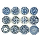 A Collection of 12 Blue and White Saucers