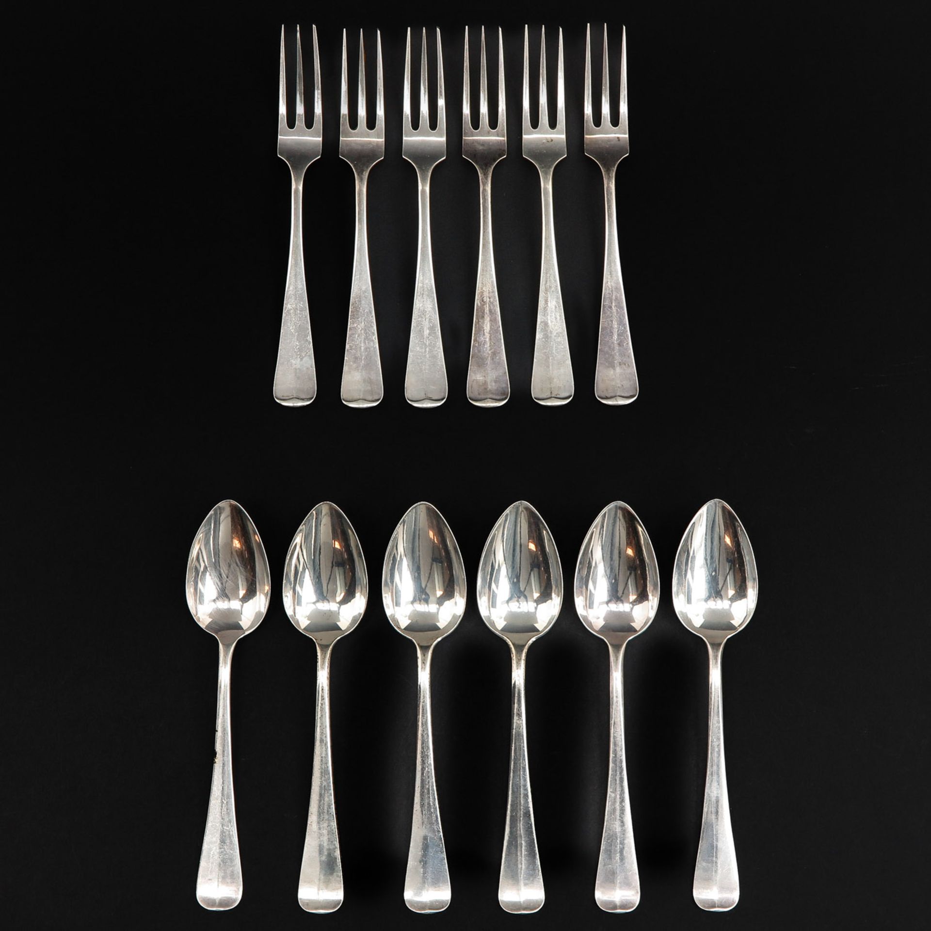 A Collection of 6 Dutch Silver Forks and Spoons