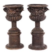 A Pair of Bronze Pedestals