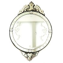 An Engraved Venetian Glass Mirror