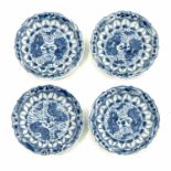 A Series of 4 Small Blue and White Saucers