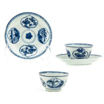 A Pair of Blue and White Cups and Saucers