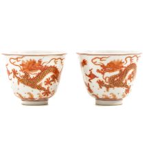 A Pair of Orange and Gilt Dragon Cups
