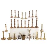 A Collection of 27 Candlesticks and 1 Mortar