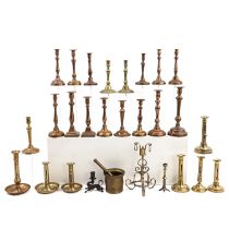 A Collection of 27 Candlesticks and 1 Mortar