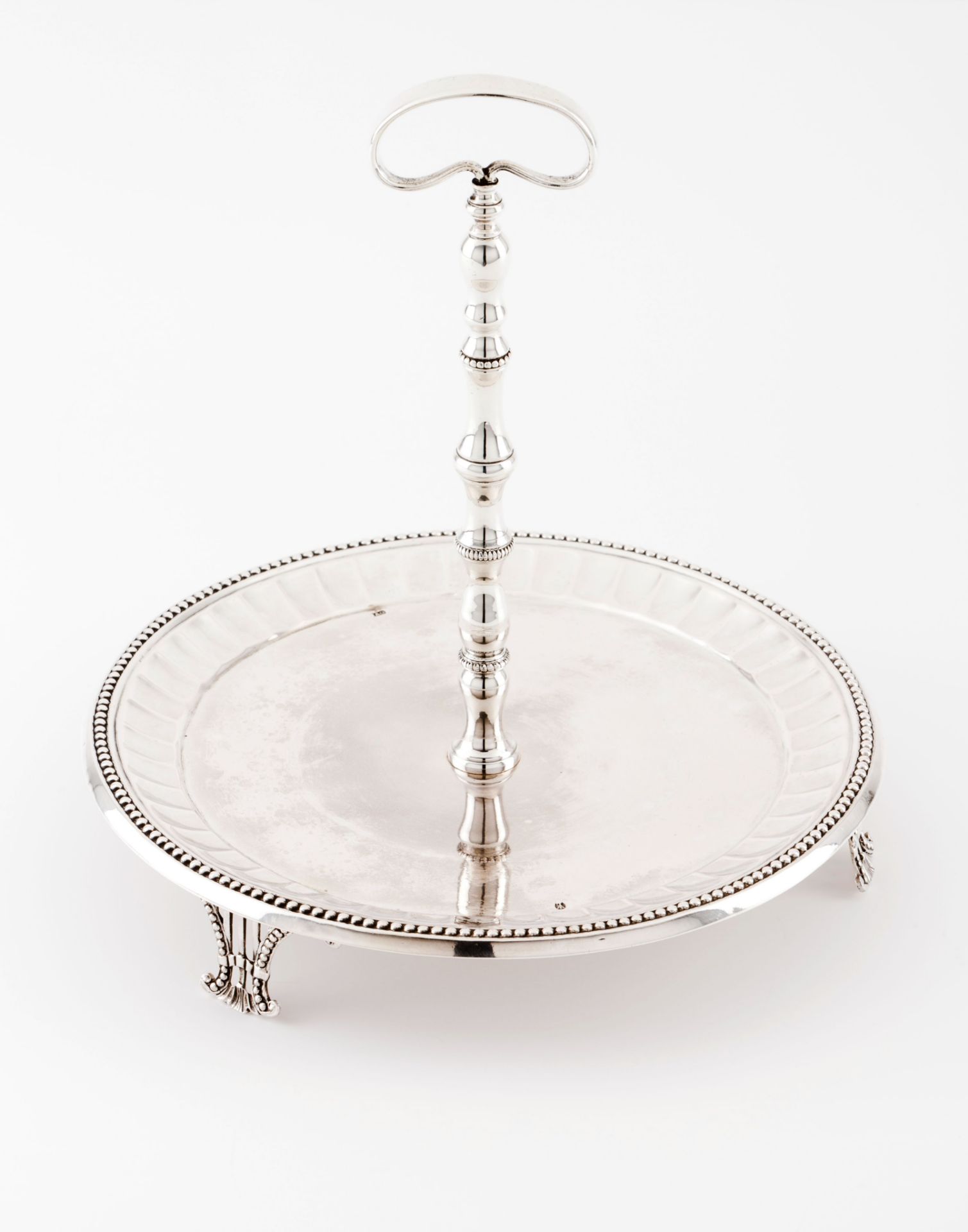 A three footed salver and stand