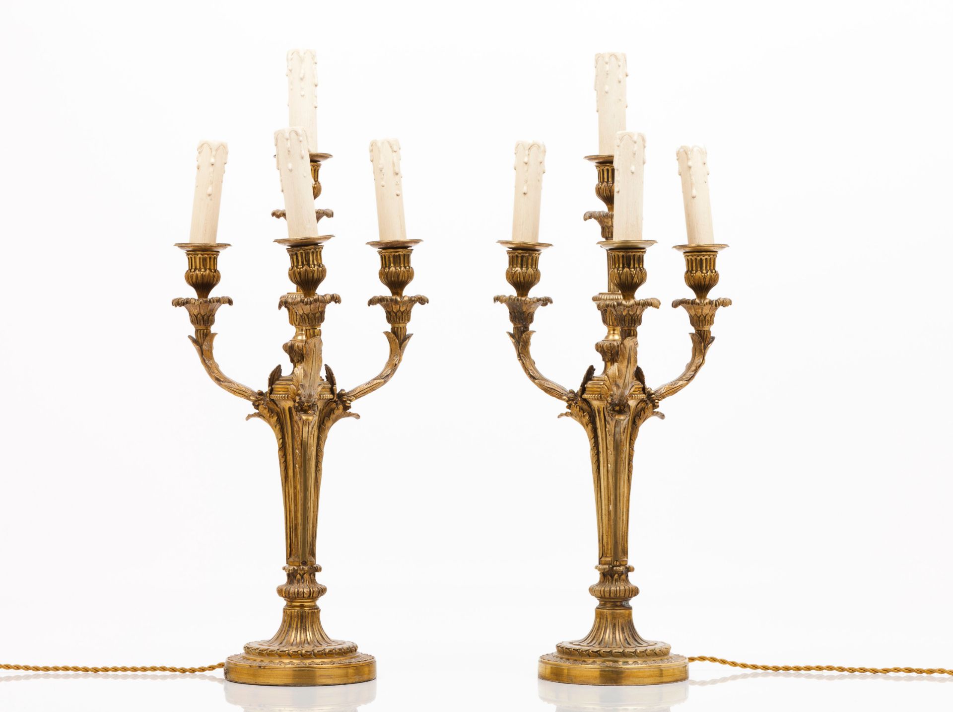 A pair of Louis XVI style lamps