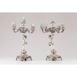 A pair of five branch candelabra