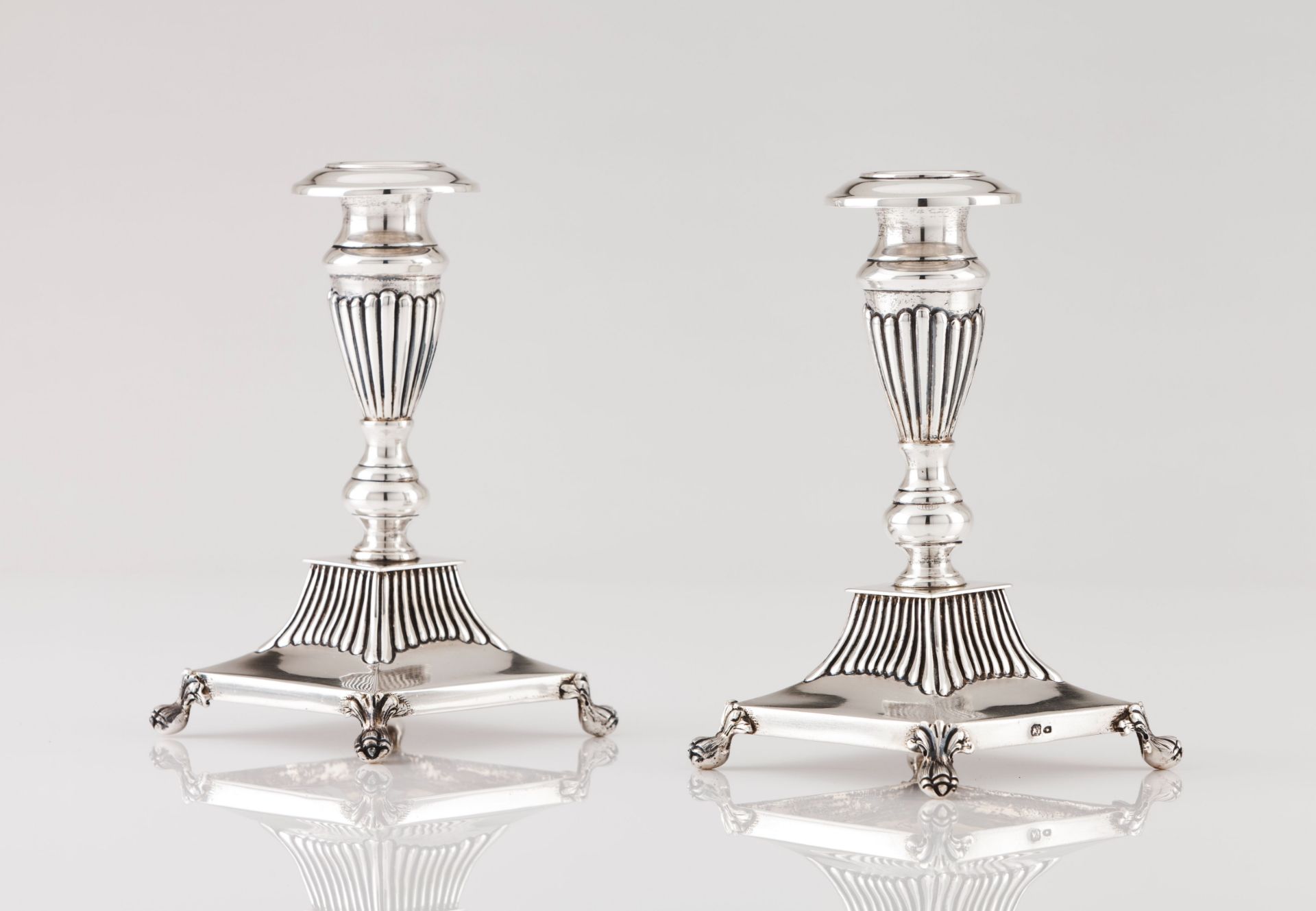 A pair of small sized candlesticks
