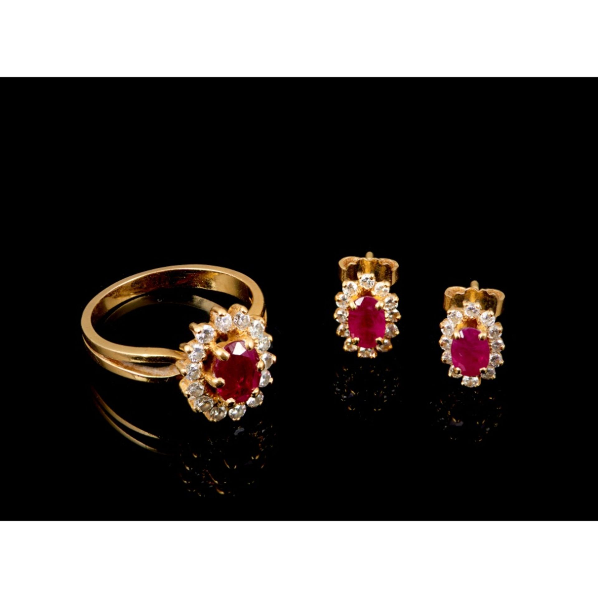 A ring and pair of earrings