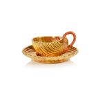 A cup and saucer by DAGOTY (1771-1840)