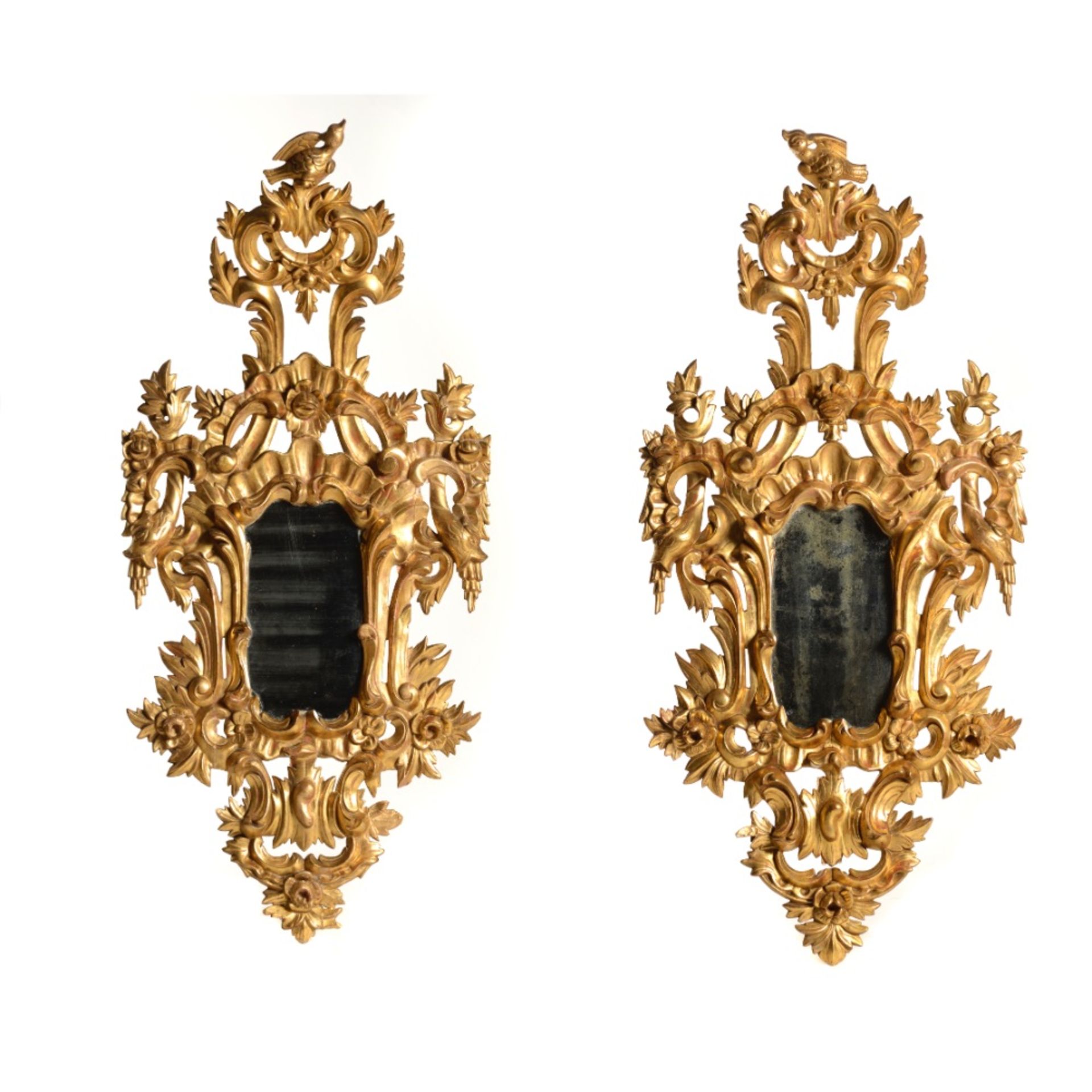 A pair of wall hanging mirrors