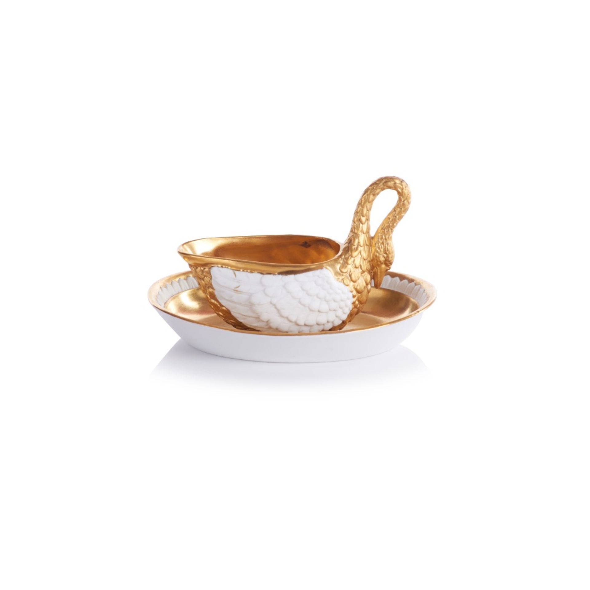 A swan shaped cup and saucer