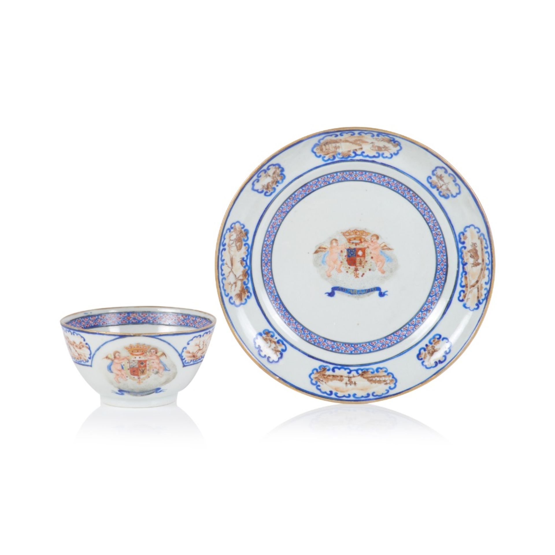 An armorial cup and saucer