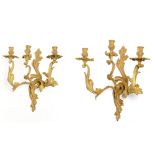 A pair of three branched Louis XVI style wall sconces