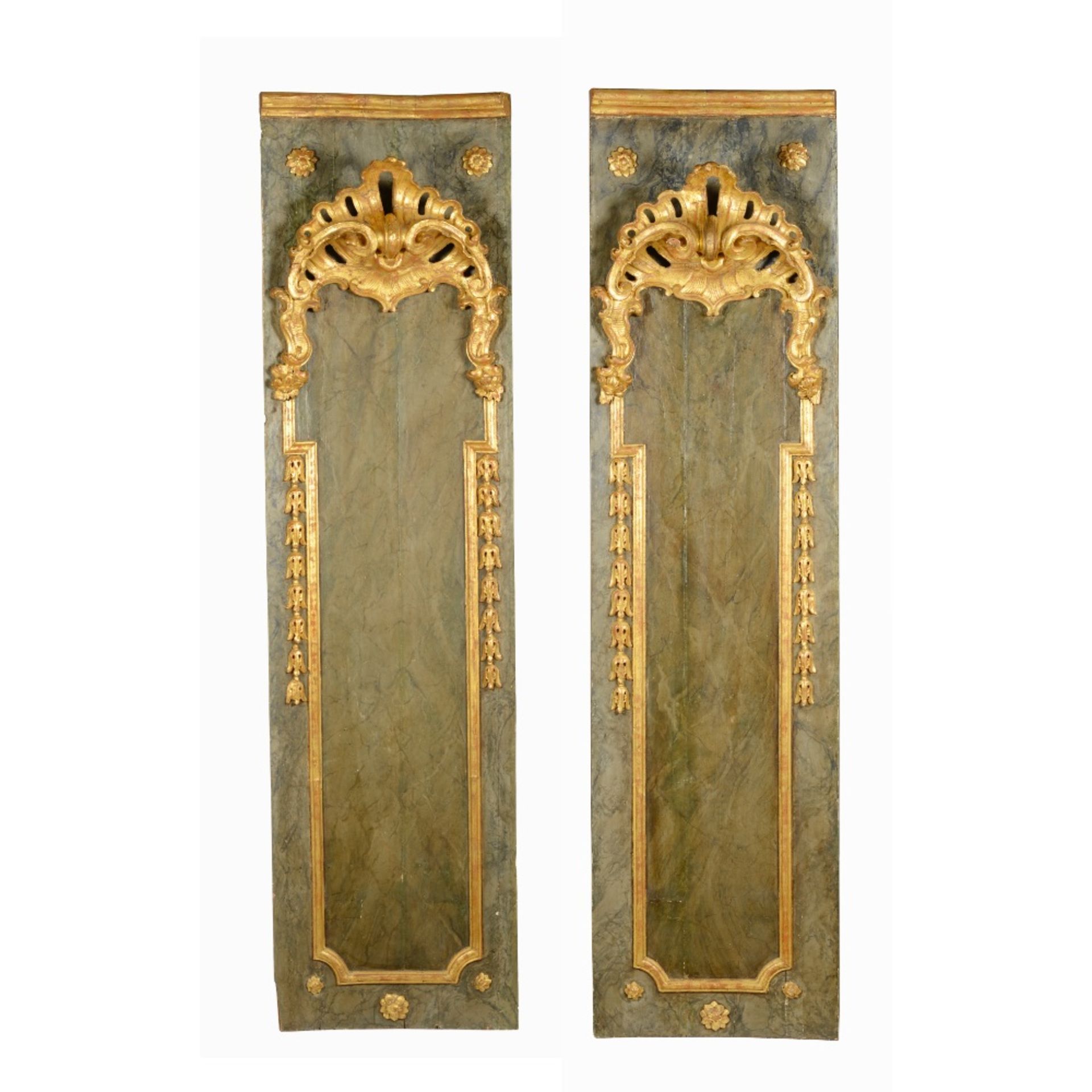 A pair of carved elements