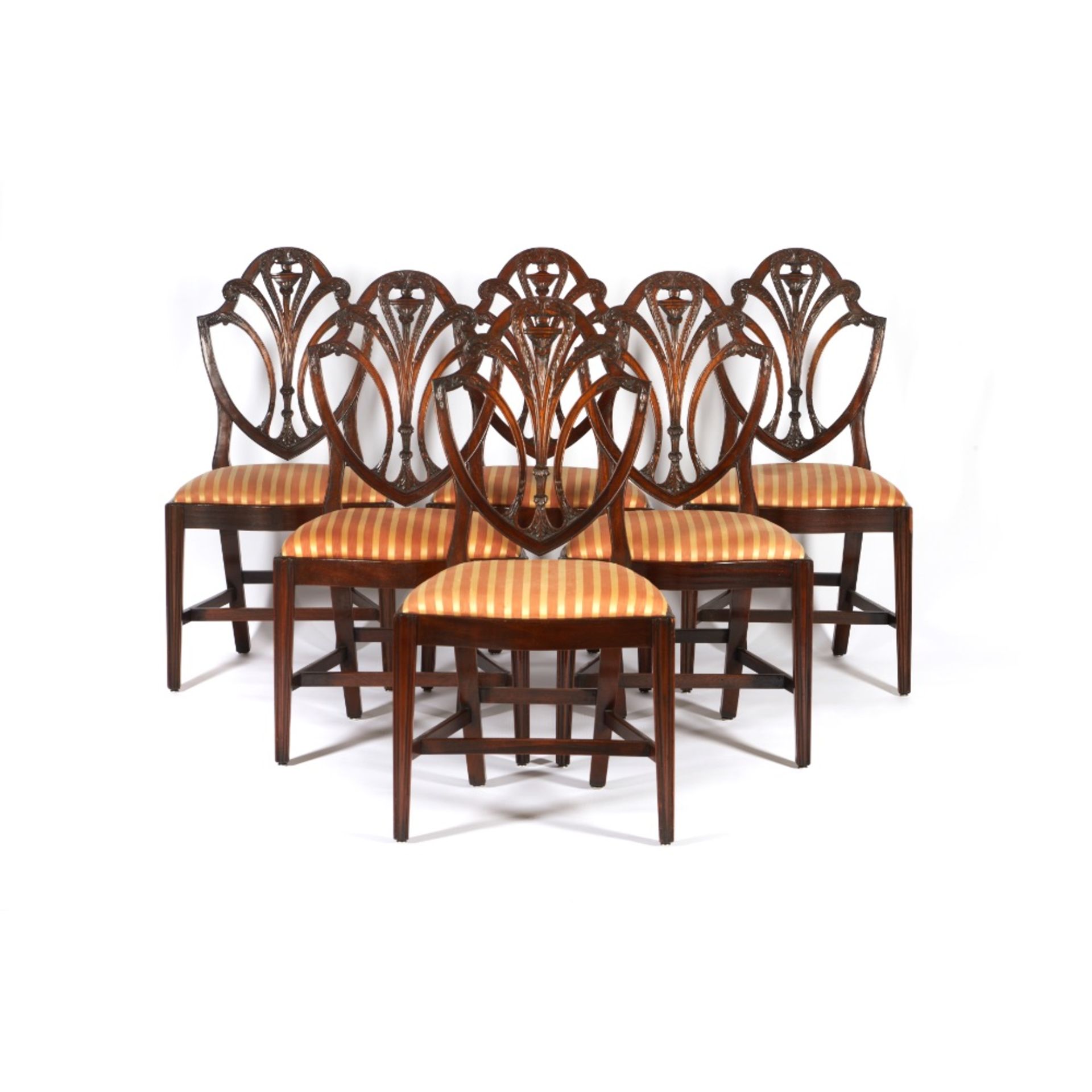 A set of twelve Hepplewhite style chairs