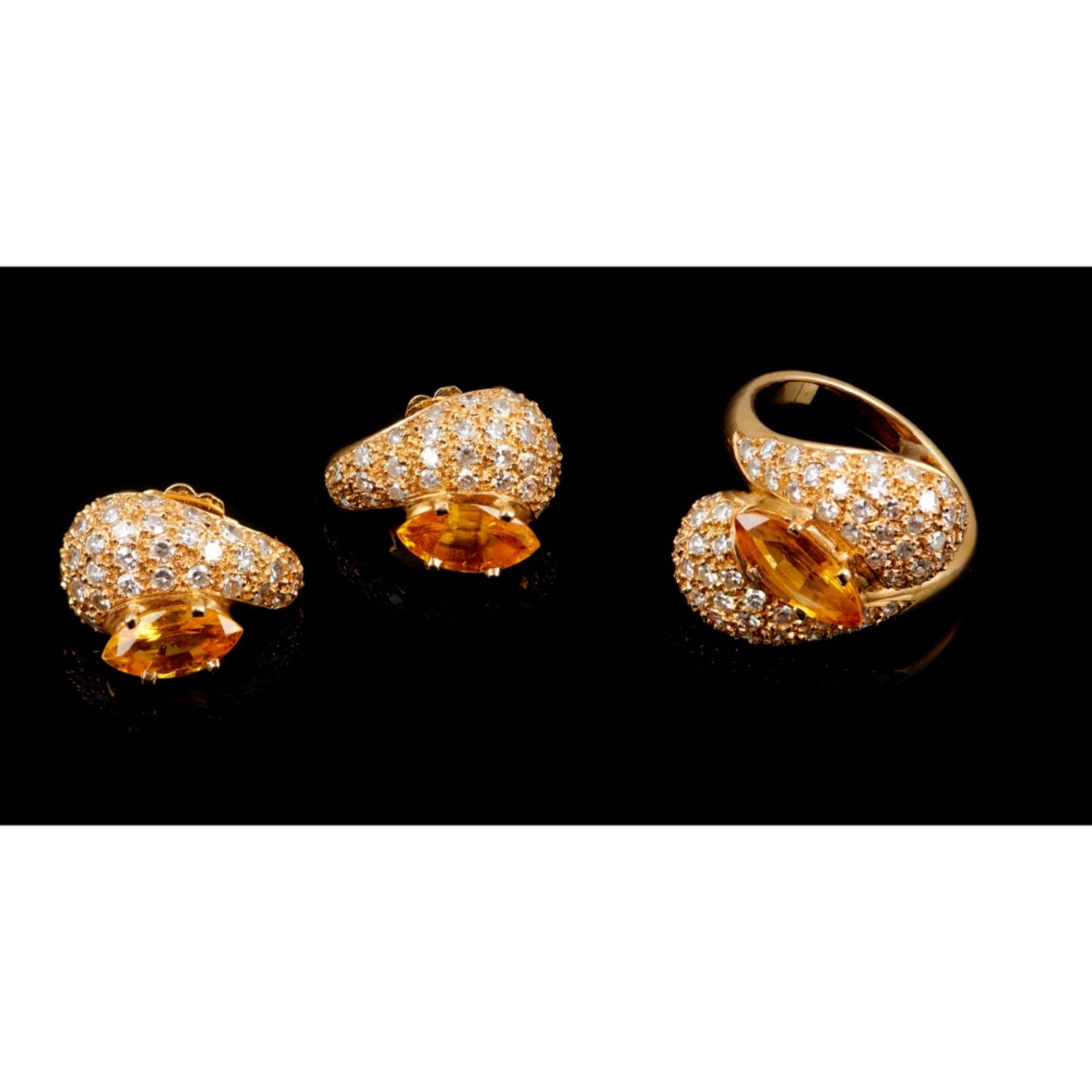 A ring and pair of earrings