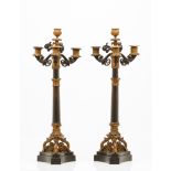 A pair of four branch Empire style candelabra